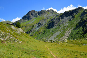 Fototapeta na wymiar Gran Paradiso National Park. Aosta Valley, Italy. Beautiful mountain landscape in sunny day. 