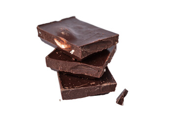 Three pieces of dark chocolate with nuts. Isolate on a white background. Close-up. selective focus