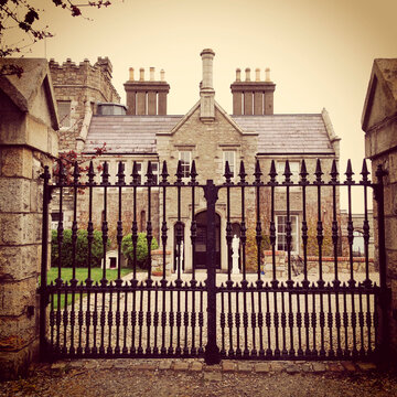 Manor house and gate in Dalkey, Ireland on a cloudy day.  Property release not necessary.