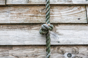 Knotted rope on wall