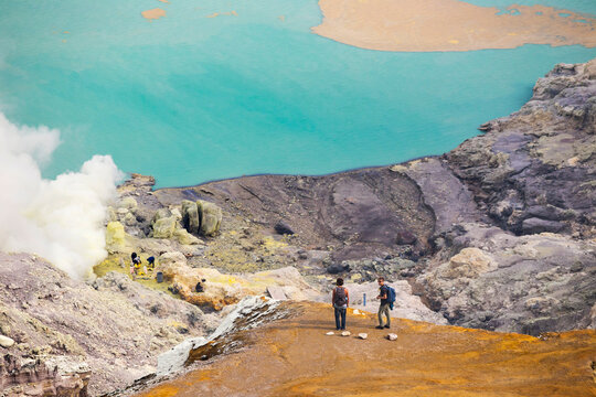 Two Men Hiking At Kawah Ijen, Java, Indonesia