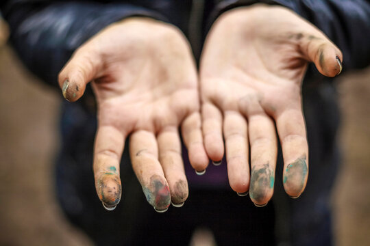 Close-up Of Graffiti Artist Messy Hands