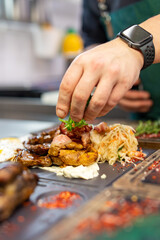 Professional chef cooking food in the kitchen restaurant