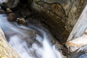 Exploring Nature's Wonders: Slow Shutter Speed Pictures of Water Flowing Among the Rocks