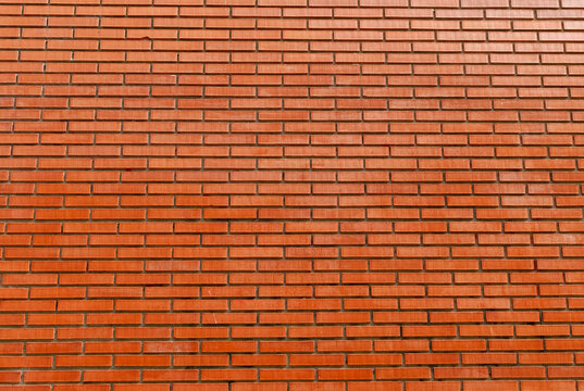 Fondo de textura de pared de ladrillos de piedra roja transparente vertical