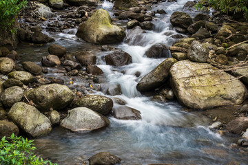 The Power of Water: Slow Shutter Speed Shots of Water Flowing Among the Rocks