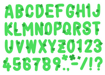 手書きのアルファベットと数字　四つ葉四つ葉のクローバーモチーフが付いた緑色のフォント