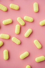 Vitamin capsules, pills or dietary supplement supports for health.