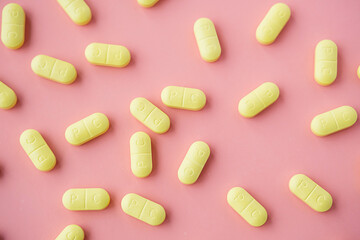 Vitamin capsules, pills or dietary supplement supports for health.