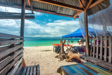 Relaxing tropical scene at White Beach,south west Moalboal,south west Cebu,Philippines.