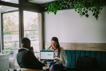 Business people at the cafe working