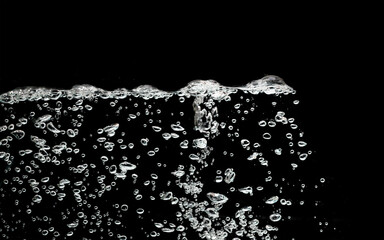 Water air bubbles, water  splash on black background. 
