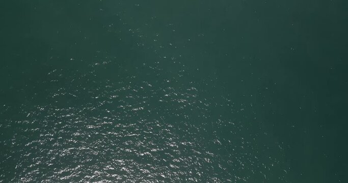 flight over sea and pan up to Isla Chora, Samara, Costa Rica