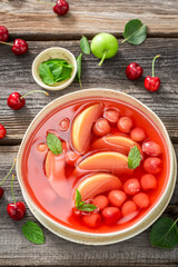 Tasty and fresh fruit soup made of cherries and apples.