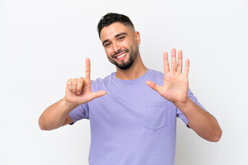 Fototapeta premium Young Arab handsome man isolated on white background counting seven with fingers
