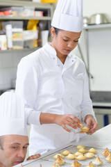 a pastry apprentice at work