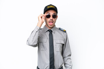 Young safeguard man over isolated white background with glasses and surprised