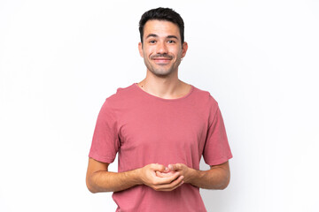 Obraz premium Young handsome man over isolated white background laughing