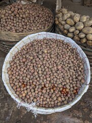 A lot of potato in a bucket