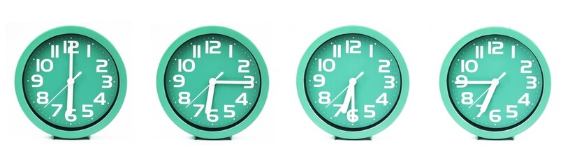 close up of a set of green clocks showing the time; 6, 6.15, 6.30 and 6.45 p.m or a.m. Isolated on white background - obrazy, fototapety, plakaty