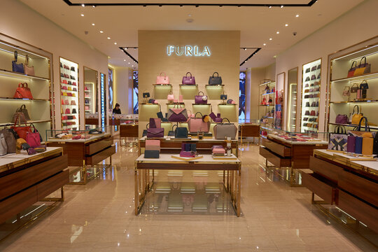 SINGAPORE - NOVEMBER 08, 2015: interior shot of Furla store in The Shoppes at Marina Bay Sands shopping mall.