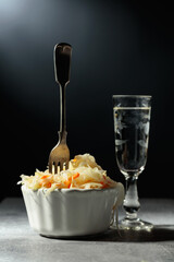Sauerkraut and a glass of vodka.