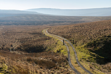 Gated track on a moor in Teesdale, County Durham, UK