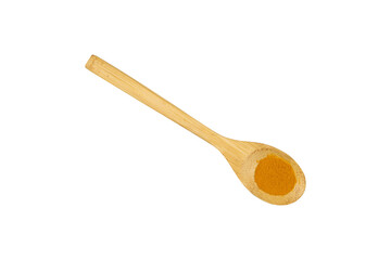 Turmeric powder in a wooden spoon isolated