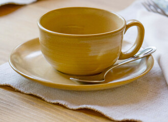 Close-up view of cup with spoon in the restaurant