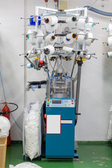Textile industry with knitting machines