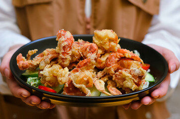 Soft-shell crab salad served with organic lettuce, clean food for health lovers