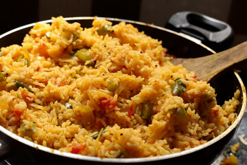 Close-up view of  tomato rice cooking, tomato rice home made 