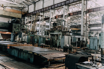 Old equipment, machines, tools in a rustic style in an abandoned mechanical factory