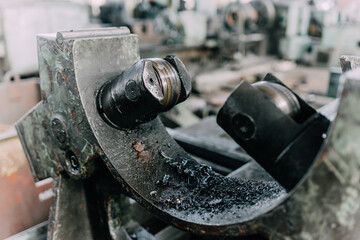 Old equipment, machines, tools in a rustic style in an abandoned mechanical factory