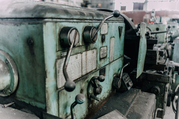 Old equipment, machines, tools in a rustic style in an abandoned mechanical factory