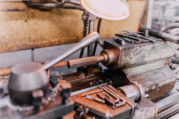 Old equipment, machines, tools in a rustic style in an abandoned mechanical factory