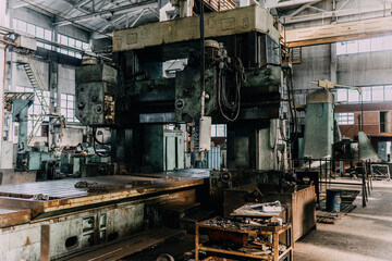 Old equipment, machines, tools in a rustic style in an abandoned mechanical factory