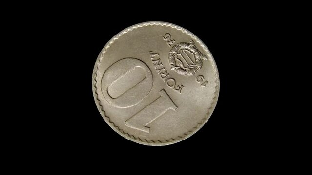 Reverse of Hungary coin 10 forint 1976, isolated in black background. 4k video