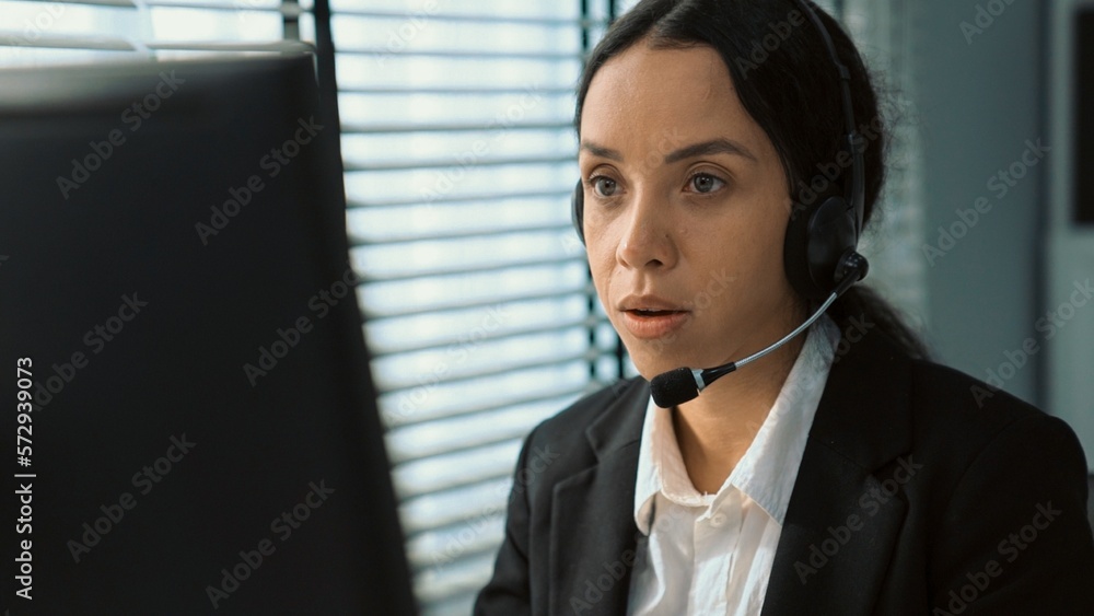 Aufkleber competent female operator working on computer and talking with clients. concept relevant to both cal