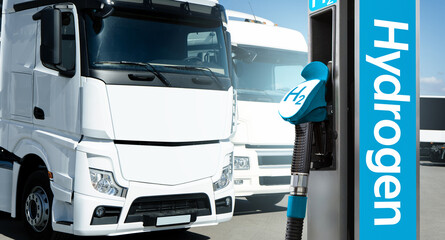 Hydrogen filling station on a background of trucks