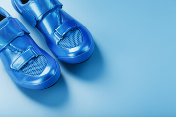 Blue highway cycling shoes on a blue background - Powered by Adobe