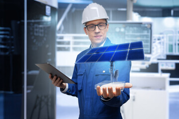 Development engineer holds in his hand a model of a solar panel created in augmented reality.