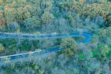 Aerial drone view autumn landscape curved road of 