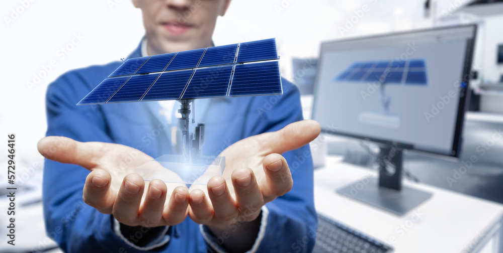 Poster Development engineer holds in his hands a model of a solar panel created in augmented reality.
