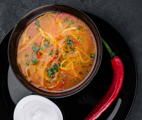 Chicken soup with noodles top view