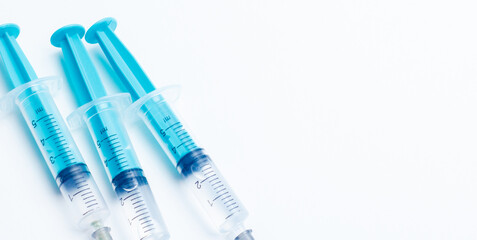 Disposable plastic syringe prepared for injection and vaccination in the hospital. The concept of medicine and health