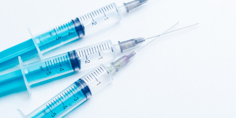 Disposable plastic syringe prepared for injection and vaccination in the hospital. The concept of medicine and health