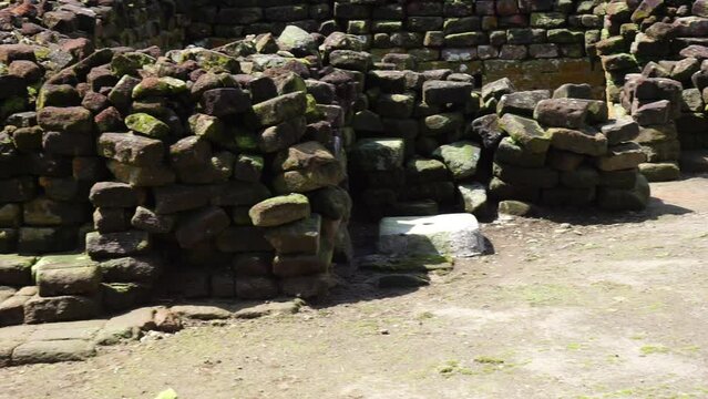 The ruins of candi sumbernanas (sumbernanas temple, candi bubrah). This temple was discovered around 1919 and was built during the reign of Mpu Sindok from the Kediri Kingdom in the 10-11th century