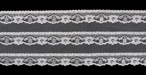 white floral lace isolated on black background - obrazy, fototapety, plakaty