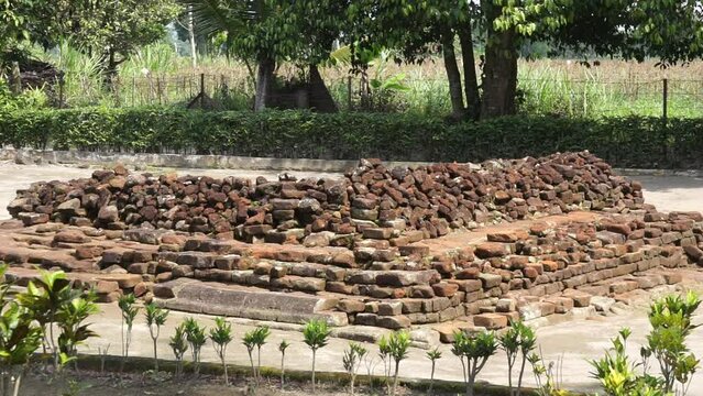 The ruins of candi sumbernanas (sumbernanas temple, candi bubrah). This temple was discovered around 1919 and was built during the reign of Mpu Sindok from the Kediri Kingdom in the 10-11th century